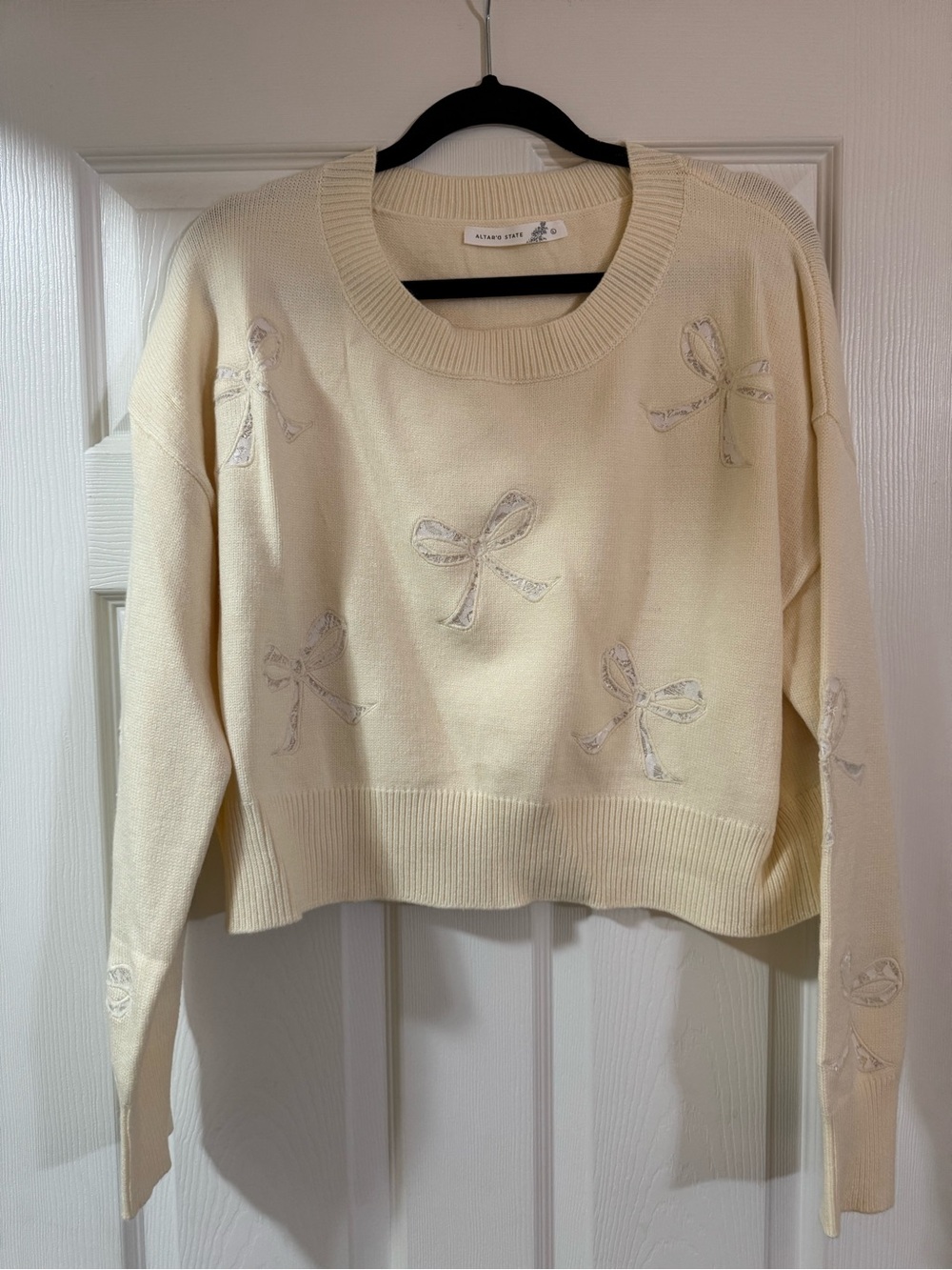 Altar'd State Cream Bow Appliqué Crewneck Sweater